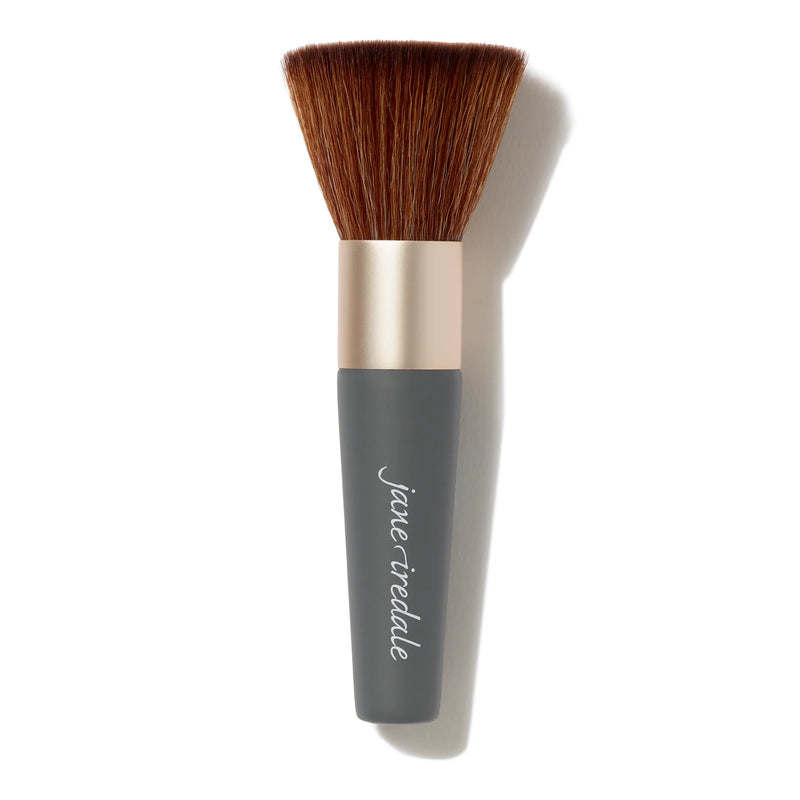 From Jane Iredale Handi Brush is a Luxurious makeup brush for professional-quality coverage. It has Soft, dense bristles for a smooth, airbrushed finish.  This brush is ideal for mineral based powders. 