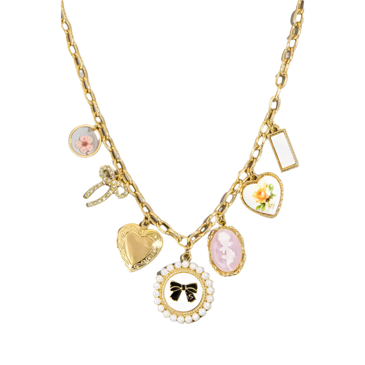 Gold necklace featuring heart-shaped pendants adorned with assorted feminine charms, including bows, and hearts, on an adjustable chain. Modern, trendy, and a classic charm necklace to at flare and style to any outfit. 