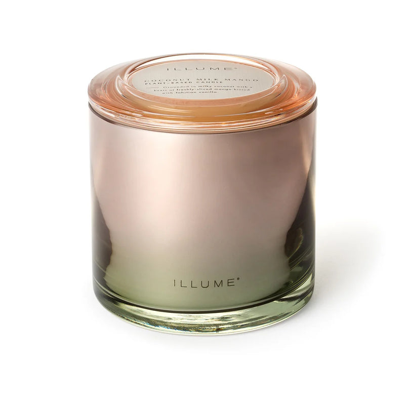 This Luxurious Illume Coconut Milk Mango Candle - 3-Wick has a  60-Hour Burn, and stands as an Elegant Statement Glass design jar that is lovely in any home, and makes for a great gift option. 