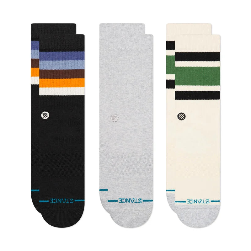 A classic staple is this 3-pack from Stance Cotton Crew Socks in the color Canvas, which features neutral tones of black, gray and cream with little pops of color on the tubing stripes along the top. They are soft, breathable cotton socks with a comfortable crew length. Versatile neutral color for everyday wear. Durable and stylish for casual, active, and all-season use. Perfect for stocking up on essentials.