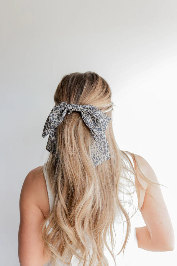 This KAXI Slouchy Cheetah Bow is Stylish and comfortable oversized bow with a trendy cheetah print, perfect for effortless chic hairstyles and statement looks.