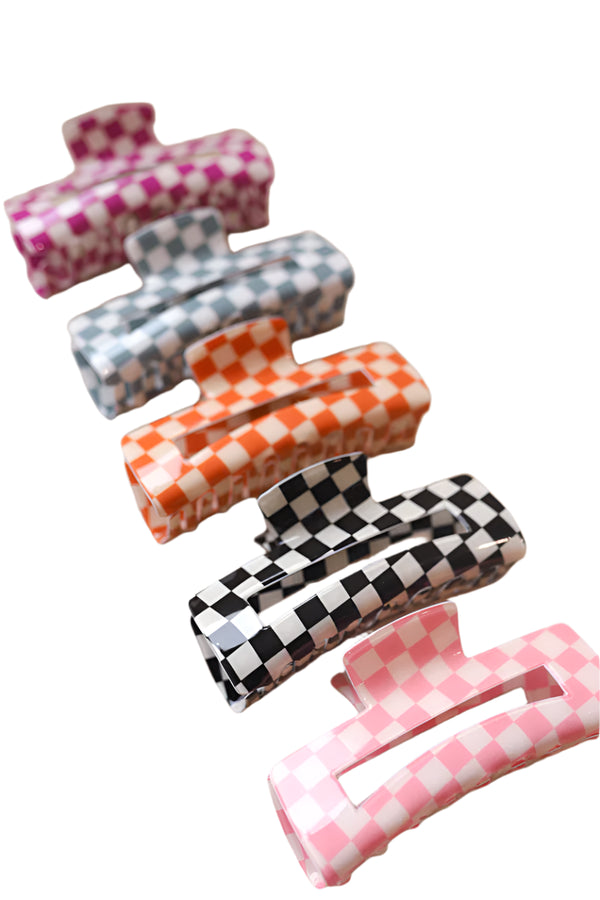 The KAXI Checkered Rectangle Claw – Trendy and durable checkered hair clip, perfect for securing all hair types with a stylish, retro-inspired design. Holds hair tight and secure. Such fun gift ideas or to make a trendy statement accessory for yourself.