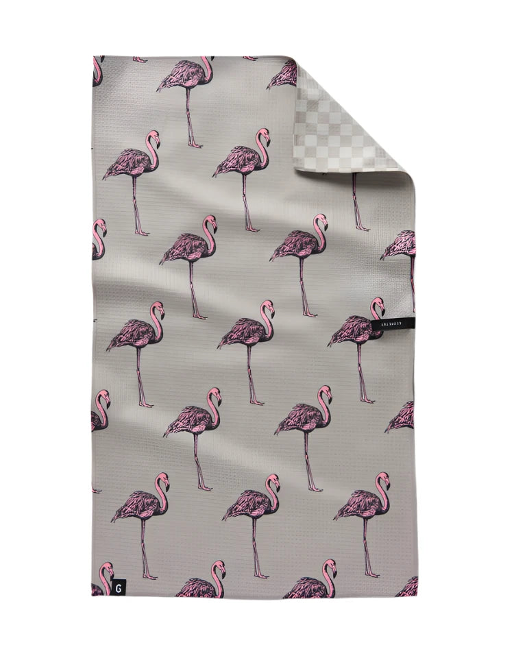 Modern Flamingo Dance tea towel with a geometric design, combining tropical charm with contemporary style. The neutral colors compliment any kitchen or bathroom and the pop of pink from the flamingo's give it character. 