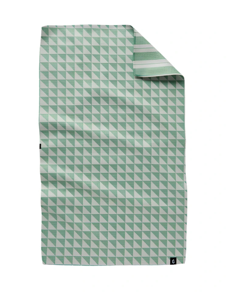 Highly absorbent double-sided tea towel in a soft light pistachio green color. Versatile and durable, perfect for everyday use in the kitchen or bathroom; offering excellent drying power with a fresh, calming color. Triangle patter on one side and a stripe patter on the flipside.