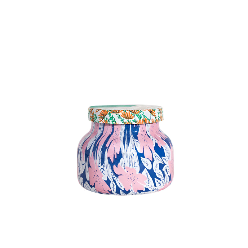 The iconic Volcano Scented Candle by Capri Blue - 8oz Jar with Notes of Sugared Citrus & Tropical Fruits. This jar makes the perfect gift, with the fun floral, colorful patterned jar sits as a decor for the home. 